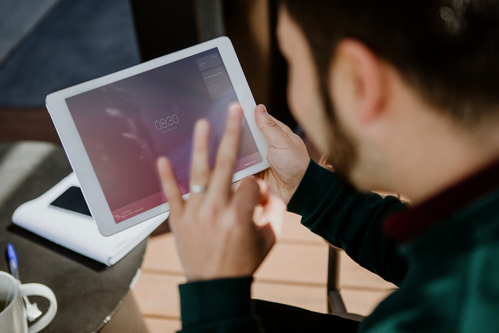 Man using a digital tablet screen mockup