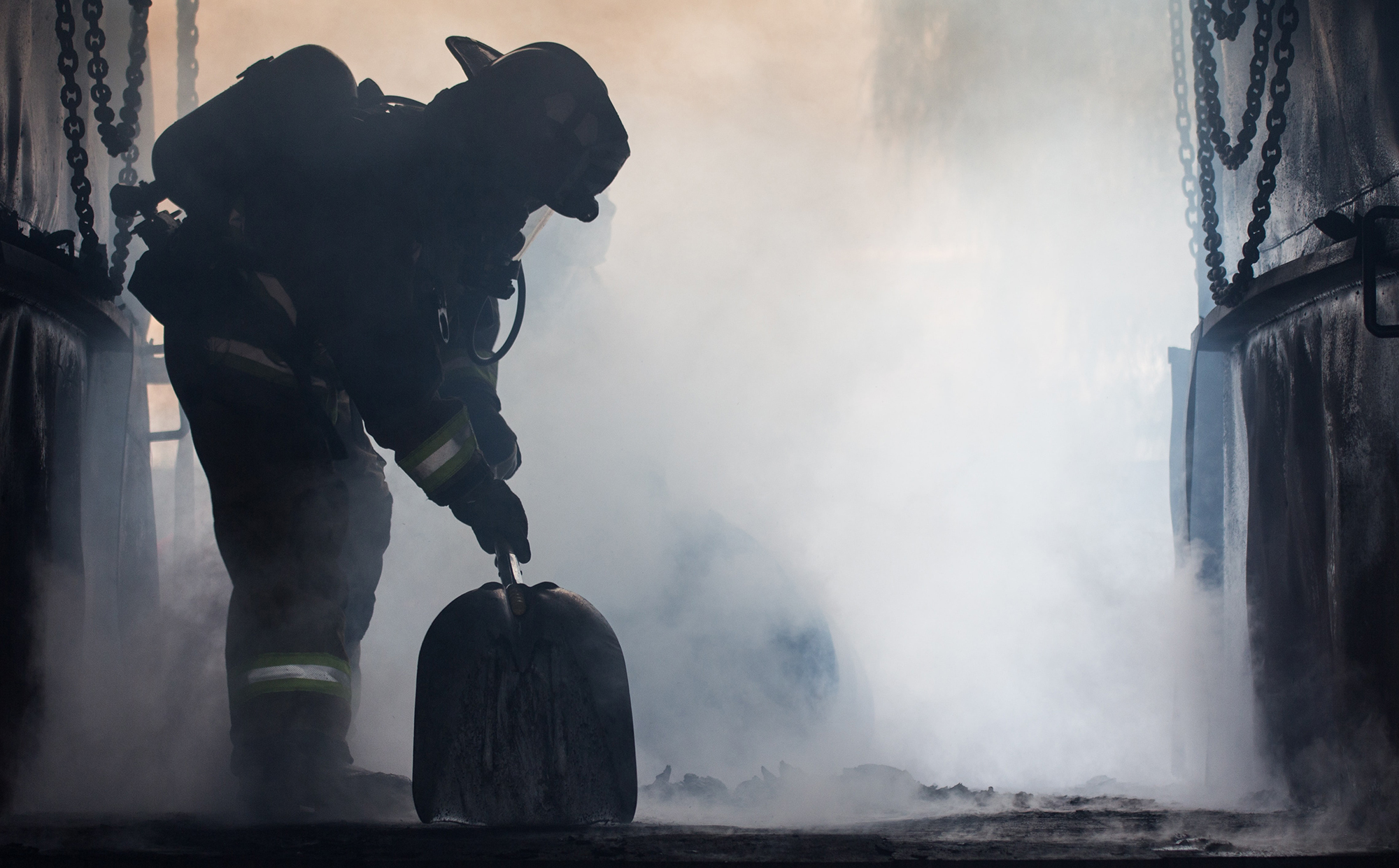 Fireman working in the steam and smoke of a fire representing the unique stressors first responders face. Therapy for First Responders in Ohio is here to help process these feelings.
