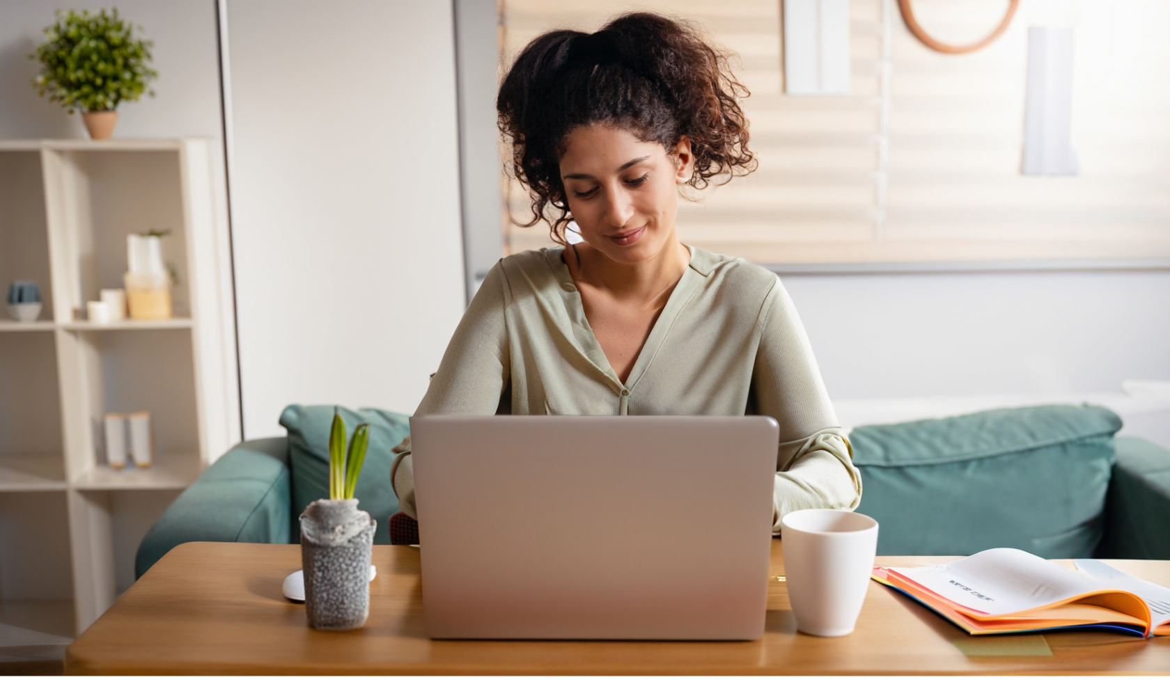 A woman participates in Online Trauma Therapy in Ohio at her home.