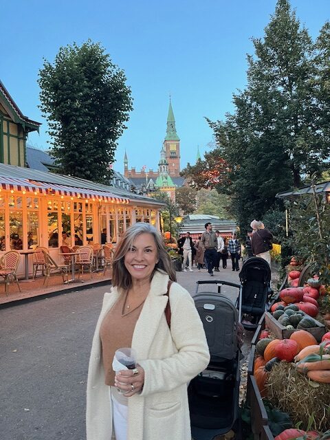 Marcy at an evening market grief counselor in Ohio and a grief counselor in Cincinnati, OH, offering compassionate grief counseling in Ohio and trauma therapy Cincinnati.